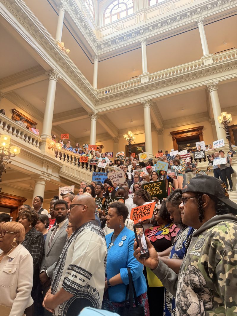 Protestors gather to protest gerrymanding at the Georgia state legislature.